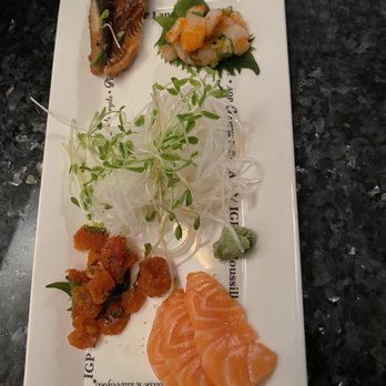 Kiku - a plate of sushi with a variety of toppings - Japanese Near Me - Montreal, Quebec