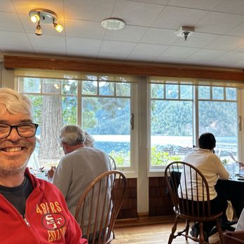 Lake Crescent Lodge - Hubby with view from table out to Lake Crescent - Hotels Near Me - Port Angeles, Washington Lake Crescent Lodge - Hubby with view from table out to Lake Crescent - Hotels Near Me - Port Angeles, Washington