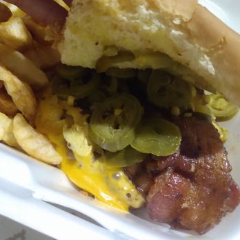 Boondoggle's Pub and Grub - a close up of a sandwich and fries - Pubs Near Me - Vevay, Indiana Boondoggle's Pub and Grub - a close up of a sandwich and fries - Pubs Near Me - Vevay, Indiana