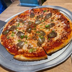Mike's Pie - Large pie with sausage, peppers and onion