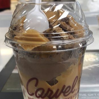 Carvel Ice Cream - A medium sundae dasher with midnight madness and chocolate chip cookie ice cream layered with peanut butter and Reese's.  Delicious! - Desserts Near Me - Old Bridge, New Jersey