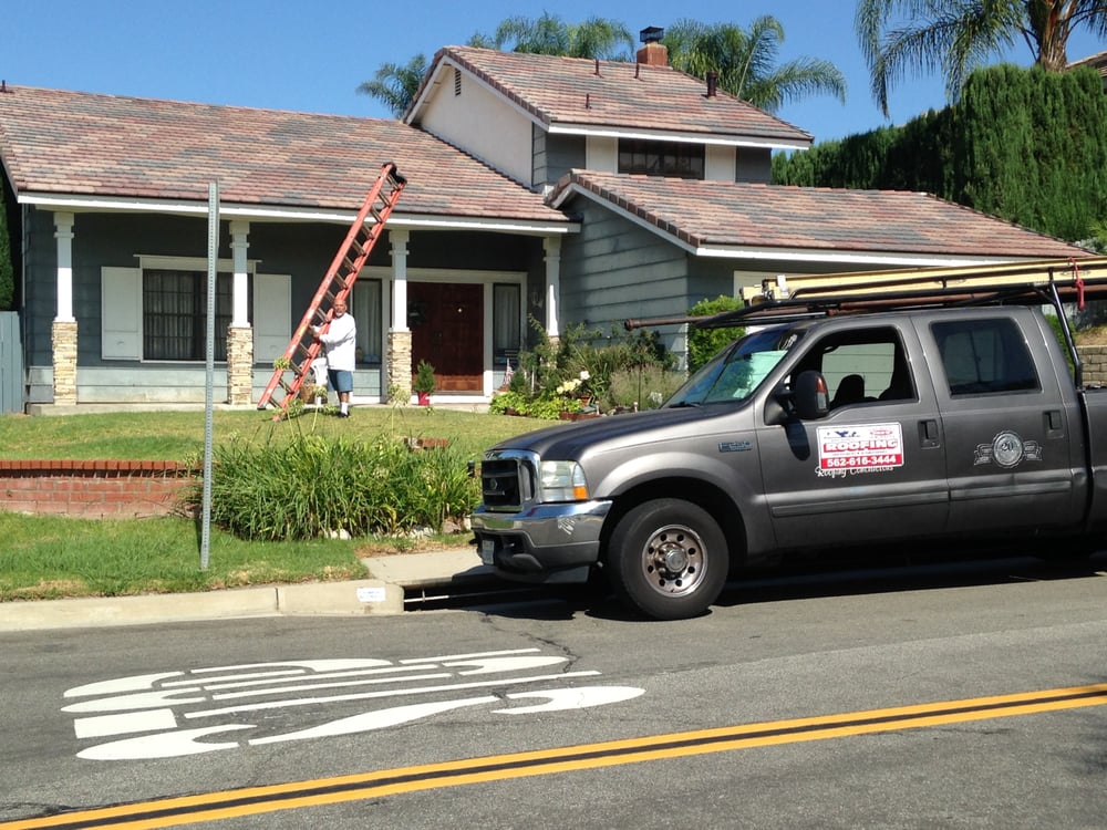 Slide of Hector's Roofing