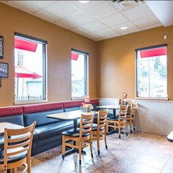 Dairy Queen Grill & Chill - One of four seating areas here a main one to the left of the doorway one outside and one just to the left of this one