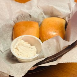 Dinner rolls with cinnamon butter.