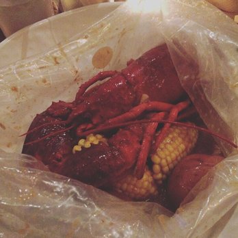 Claw Daddy's - Sooo. As if 3 starters where'nt enough - I just had to order this. An entire lobster in a bag of spicey goodies. It was beautiful! - Cajun/Creole Near Me - New York, New York