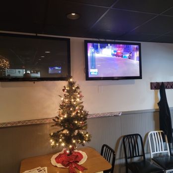 Dark Horse Restaurant - a christmas tree and television - American Near Me - Findlay, Ohio