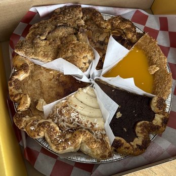 Pots & Pans Pie Co. - Frankenpie: Pineapple Passionfruit, Butterscotch, Apple Crumble, Blackbottom Frangipane, Cashew Coconut Cream, Sugar Creme Brûlée - Bakeries Near Me - Indianapolis, Indiana