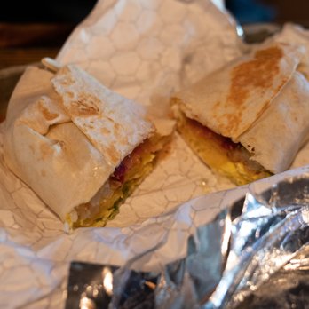 Home Team BBQ - a burrito wrapped in aluminum foil - Barbeque Near Me - Aspen, Colorado