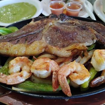 Casa Amigos Mexican Restaurant - My overcooked, salty rib eye, and tough shrimp, peppers and onions - Mexican Near Me - San Antonio, Texas