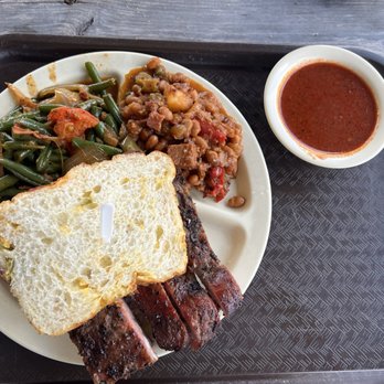 Goode Company Barbeque - Two meat combo with jalepenos cheese bread and barbecue sauce on the side - Barbeque Near Me - Houston, Texas Goode Company Barbeque - Two meat combo with jalepenos cheese bread and barbecue sauce on the side - Barbeque Near Me - Houston, Texas