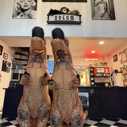 Odeum Theater - The lobby with two of their awesome employees in T-Rex costumes for Jurassic Park.