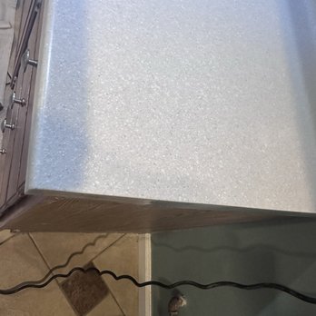 Back To Perfection - This is the countertop that had the bag burn and crack. Only the stove is now removed and it looks brand new. - Refinishing Services Near Me