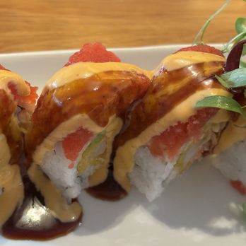 Hooked on Sushi - Carlsbad - GOLDEN DRAGON roll (in: eel and krab. out: salmon, avocado, eel sauce, and spicy mayo) - Sushi Bars Near Me - Carlsbad, California