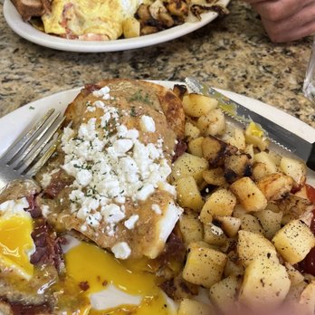 The Cozy Grill - Eggs Benedict with goat cheese and crispy prosciutto and a warm fig sauce that was freakin' delicious , with Home fries - Breakfast & Brunch Near Me - Warwick, Rhode Island The Cozy Grill - Eggs Benedict with goat cheese and crispy prosciutto and a warm fig sauce that was freakin' delicious , with Home fries - Breakfast & Brunch Near Me - Warwick, Rhode Island