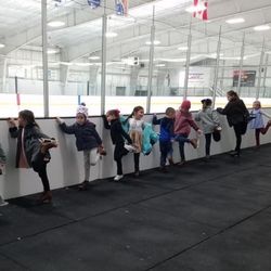 Ice Sports Center - Picture of a group of young friends at the hockey rink at Huntsville Ice Sports Center.