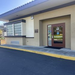 Rodney J Chew, DDS - Front door is located at the corner of the building next to the stop sign.