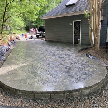 Coastal Interlock - a concrete patio being installed - Masonry/Concrete Near Me Coastal Interlock - a concrete patio being installed - Masonry/Concrete Near Me