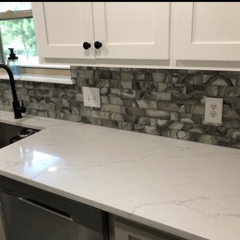 Premier General Contractors - We put in a new tile backsplash on this project. - Painters Near Me