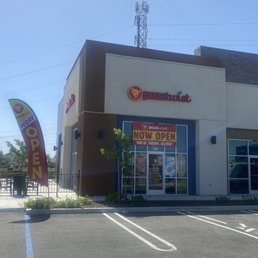 Exterior outside entrance of Pizza Twist - Store front with patio. - Roseville, California Exterior outside entrance of Pizza Twist - Store front with patio. - Roseville, California