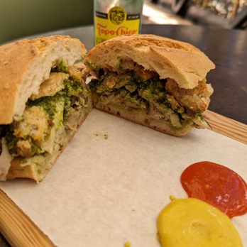 Meat & Bread - Porchetta sandwich with sambal and a unique mustard for dipping - Sandwiches Near Me - Austin, Texas Meat & Bread - Porchetta sandwich with sambal and a unique mustard for dipping - Sandwiches Near Me - Austin, Texas