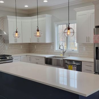 Apex Home Solutions - a kitchen with stainless steel appliances - General Contractors Near Me