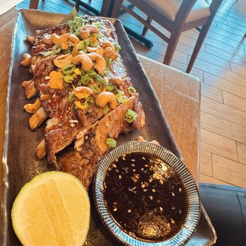Roka Akor - Oak Brook - Glazed Pork Ribs, Crushed Cashews, Spring Onions - Japanese Near Me - Oak Brook, Illinois Roka Akor - Oak Brook - Glazed Pork Ribs, Crushed Cashews, Spring Onions - Japanese Near Me - Oak Brook, Illinois