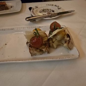 Il Terrazzo Carmine - Two remaining pieces of the Bruschetta Trio (6 total). - Italian Near Me - Seattle, Washington Il Terrazzo Carmine - Two remaining pieces of the Bruschetta Trio (6 total). - Italian Near Me - Seattle, Washington