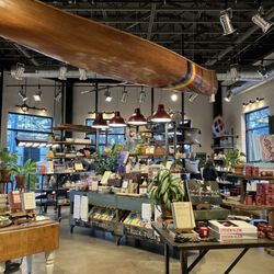 The Merchant - Canoe suspended from the ceiling, and some beautiful merchandise displays