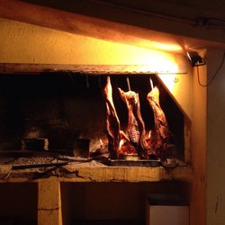 Lu Colbu - Wildschweinhälften über dem Feuer