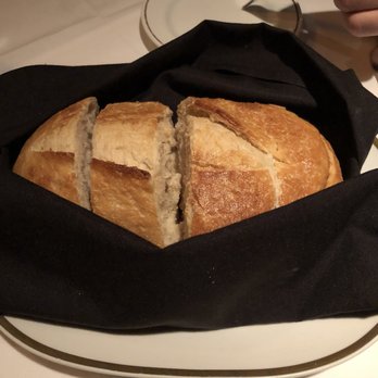 Arroyo Chop House - Half and half loaf, sourdough and garlic bread. Hard to to eat the whole basket! - Steakhouses Near Me - Pasadena, California