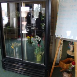 Deer River Floral & Gifts - Only one small cooler - mostly empty, wilted flowers - lame!