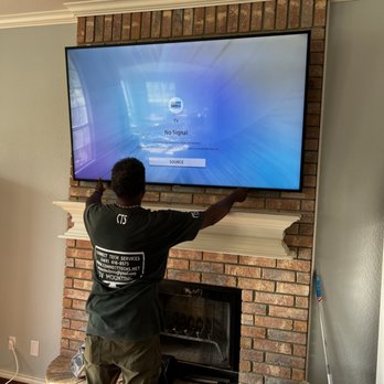 Connect Tech Services - Brick fireplace installation.  We created power where there was none for this customer. - Home Theatre Installation Near Me