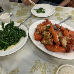 Ginger and scallion twin lobsters and pea tips