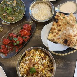 Palak Paneer Hyderabadi Goat Dum Biryani Garlic Naan