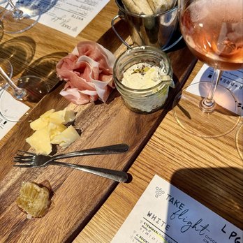 Sixty Vines - Board with prosciutto, cabot clothbound cheddar, and the house made ricotta - New American Near Me - Nashville, Tennessee Sixty Vines - Board with prosciutto, cabot clothbound cheddar, and the house made ricotta - New American Near Me - Nashville, Tennessee
