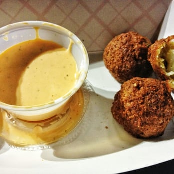 The Caboose - Crab Ballz in spicy dipping sauce. - Food Trucks Near Me - San Marcos, Texas The Caboose - Crab Ballz in spicy dipping sauce. - Food Trucks Near Me - San Marcos, Texas