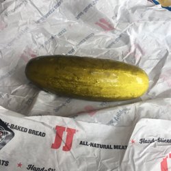 Jimmy John's - I asked for a whole pickle and they gave it to me.