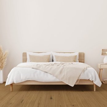 Laguna Flooring - a bedroom with a bed and a nightstand - Carpeting Near Me - Laguna Beach, California Laguna Flooring - a bedroom with a bed and a nightstand - Carpeting Near Me - Laguna Beach, California