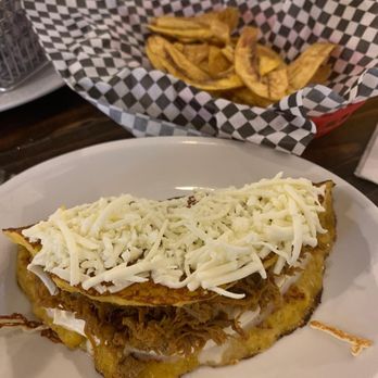 Que Chevere - Cachapa (beef I think) the cheese is amazing! Also good with the cilantro sauce - Venezuelan Near Me - Mesa, Arizona Que Chevere - Cachapa (beef I think) the cheese is amazing! Also good with the cilantro sauce - Venezuelan Near Me - Mesa, Arizona