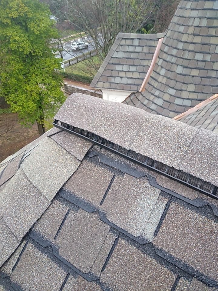 Slide of Henderson Roofing