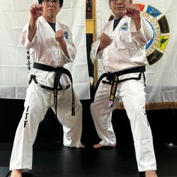 Metuchen Martial Arts Center - Mr. Luis Torres (Left, II Dan), Mr. Kevin Torres (Right, III Dan)