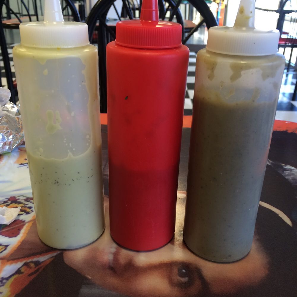 Mr Tako - These are the sauces they give you for your tacos. Creamy Avocado, Chile Diablo, and Jalapeño. Try them all! My mouth is currently on fire. - Tacos Near Me - McKinney, Texas