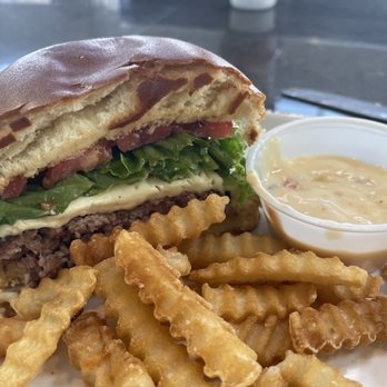 Stinger’s Waterfront - Cheese Cheeseburger with fries and queso - American Near Me - Ridley Park, Pennsylvania Stinger’s Waterfront - Cheese Cheeseburger with fries and queso - American Near Me - Ridley Park, Pennsylvania