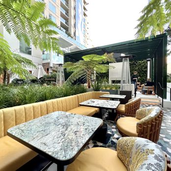 Living Room - Outdoor dining space. It is cozy & comfortable. Wasn't cold either since it's surrounded by buildings. - Lounges Near Me - Los Angeles, California Living Room - Outdoor dining space. It is cozy & comfortable. Wasn't cold either since it's surrounded by buildings. - Lounges Near Me - Los Angeles, California