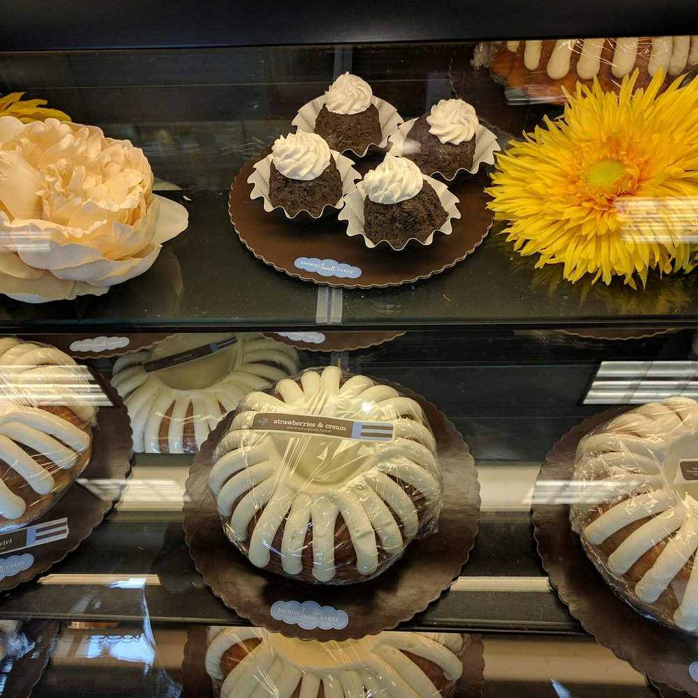 Nothing Bundt Cakes - Bundtinis on top. Full size cakes are under. Bundlet which are smaller and $4 each are on the bottom. - Bakeries Near Me - Miami, Florida