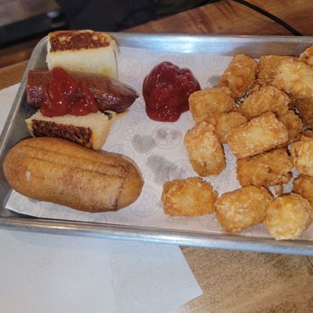 Dog Haus - Kids meal with a mini corn dog and hot dog on a Hawaiian roll with tots - Burgers Near Me - Burbank, California