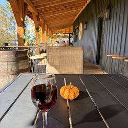 Hamilton Harvest Winery - A glass of wine on the porch