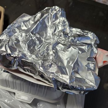 Trio Fast Food - Very effective foil takeout wrapping for the deep-fried chicken leg. Keeping warm and crispy. - Chinese Near Me - Markham, Ontario Trio Fast Food - Very effective foil takeout wrapping for the deep-fried chicken leg. Keeping warm and crispy. - Chinese Near Me - Markham, Ontario