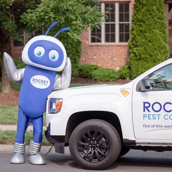 Rocket Pest Control - Meet Rocket Pest's friendly mascot, waving in front of our pest control service car--ready to tackle your pest problems! - Pest Control Near Me - Greenville, South Carolina Rocket Pest Control - Meet Rocket Pest's friendly mascot, waving in front of our pest control service car--ready to tackle your pest problems! - Pest Control Near Me - Greenville, South Carolina