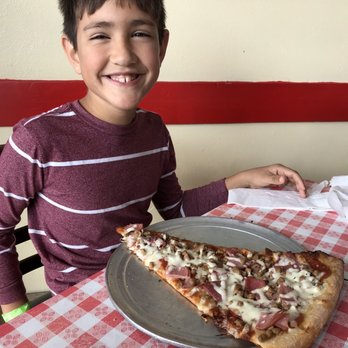 Two Guys Pizzeria - Giant Meat Lovers Deluxe Pizza Slice - Pizza Near Me - Houston, Texas Two Guys Pizzeria - Giant Meat Lovers Deluxe Pizza Slice - Pizza Near Me - Houston, Texas